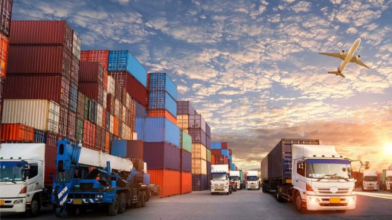 Articulated goods lorries lined up at border customs lanes at a UK-EU cross-Channel freight terminal. UK-EU trade regulations 2026
