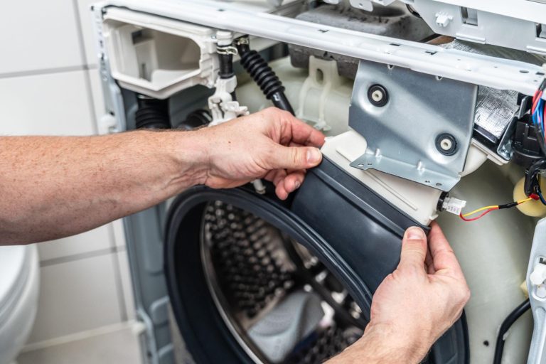 Why EU consumers are choosing repair over replacement A technician repairing a household appliance using a replacement spare part - EU consumers choosing repair over replacement